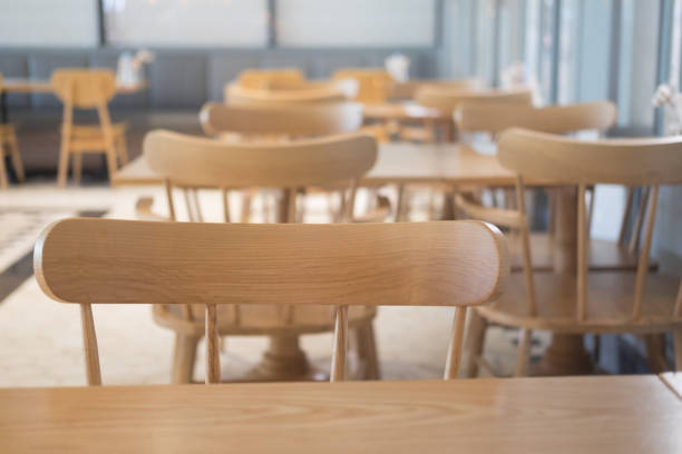 istock Wooden elegant tables with chairs crate pleasant atmosphere 954261592