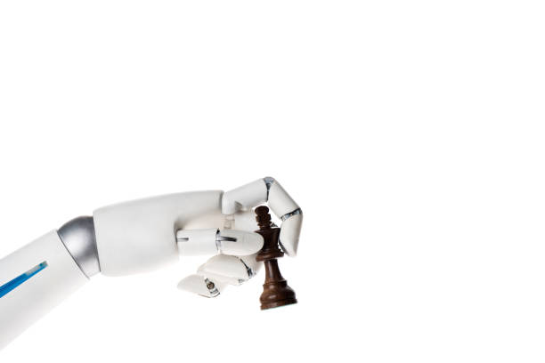 istock robot hand holding chess king figure isolated on white 954261718
