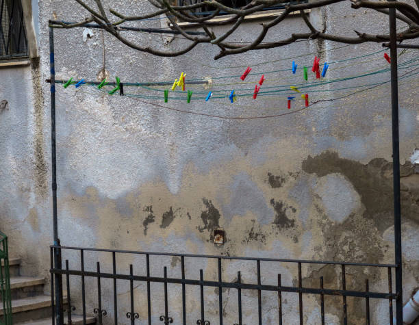 istock clothesline with brightly colored plastic clothespins, Haifa, Israel 954264984