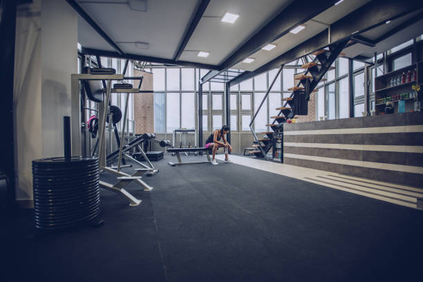 istock Girl alone in gym 954265854