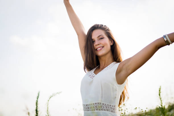 istock Young beautiful woman spending time in nature 954266212