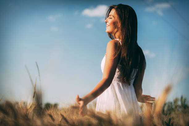 istock Young beautiful woman spending time in nature 954266528