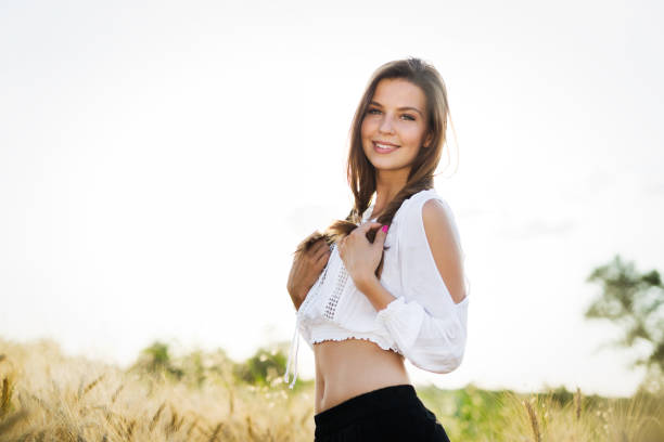 istock Young beautiful woman spending time in nature 954266814