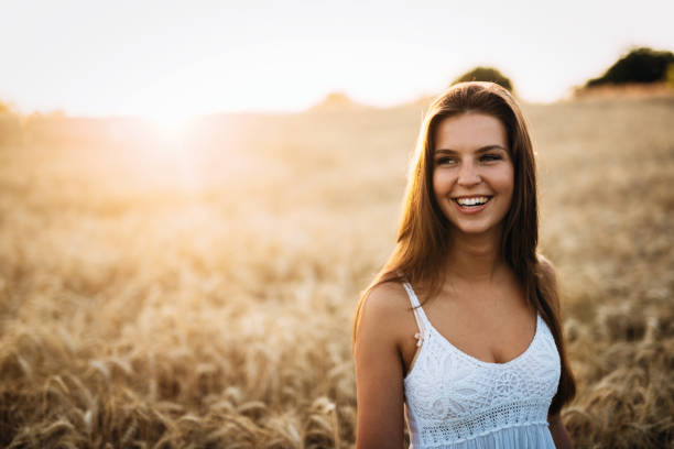 istock Young beautiful woman spending time in nature 954267366