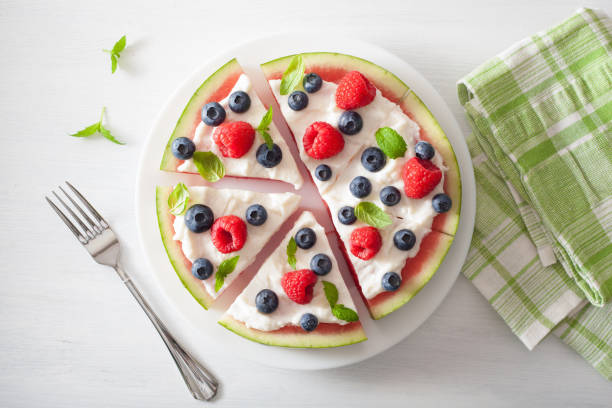istock watermelon pizza slices with yogurt and berries, summer dessert 954267368