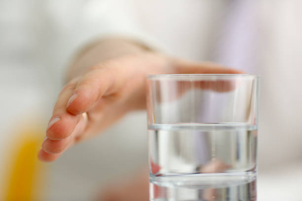 istock Male arm stretching out to glass 954267768