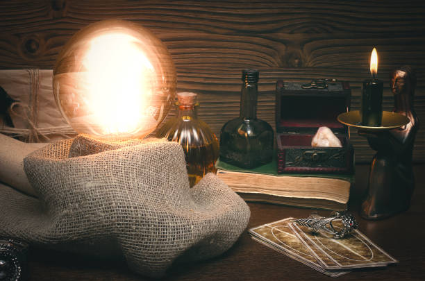 istock Crystal ball and tarot cards. Fortune teller magic table. Future reading concept. 954270832