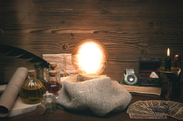 istock Crystal ball and tarot cards. Fortune teller magic table. Future reading concept. 954270918