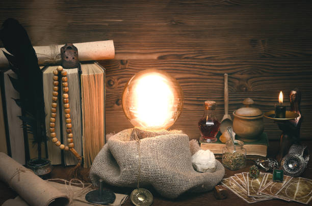 istock Crystal ball and tarot cards. Fortune teller magic table. Future reading concept. 954271402