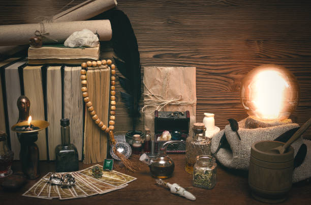 istock Crystal ball and tarot cards. Fortune teller magic table. Future reading concept. 954273966