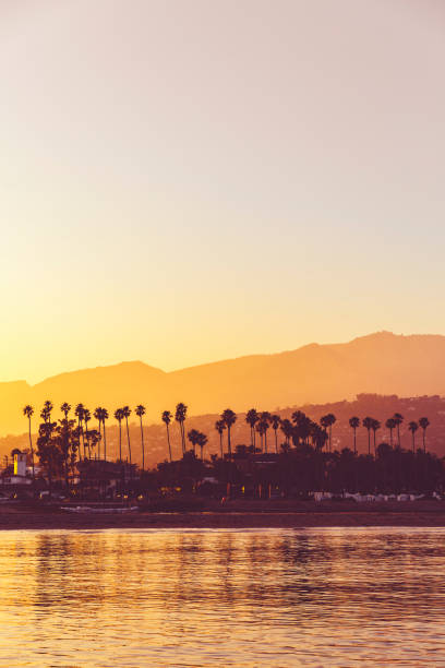 Santa Barbara Sunset with Palm Trees View over Santa Barbara at Sunset santa barbara california photos stock pictures, royalty-free photos & images