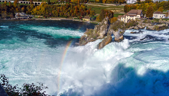The Rhine Falls near Zurich at Indian summer, largest waterfall in Switzerland