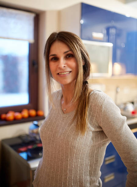 istock Woman standing in her kitchen 954286826