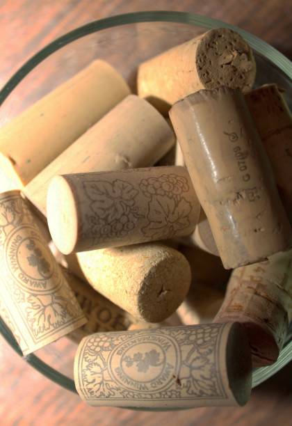 istock Wine Corks in a jar on a wooden table 954296176