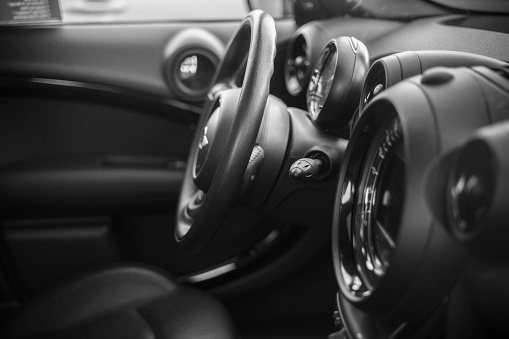 Hamburg, Germany - May 01. 2018: A close up of the dashboard from a new Mini John Cooper Works compact performance car in Hamburg, Germany on a public dealership. no people im this image.