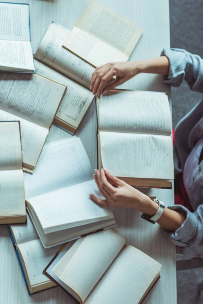 istock girl studying with books 954299520