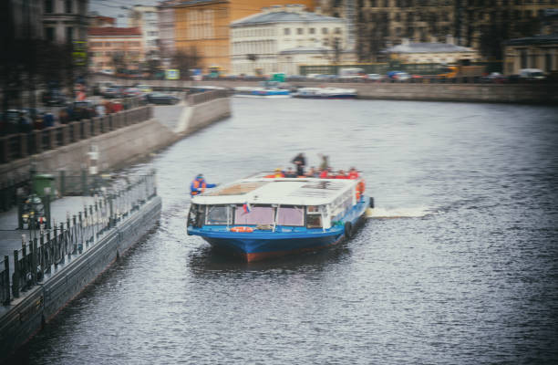 istock Excursions on the river tram near the anichkov bridge. 954300400