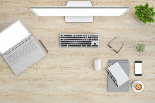 Top view, knolling concept of a business office desk, with laptop, paper, plant, and accessories. background copy space mock up for designers. blank screen. render