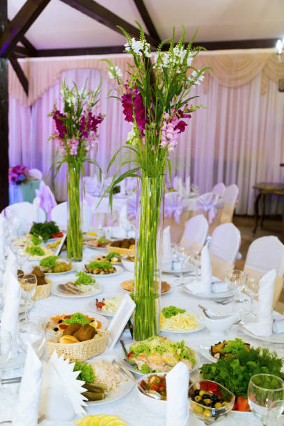 istock Banquet, tables, flowers, glasses, plates. 954306082