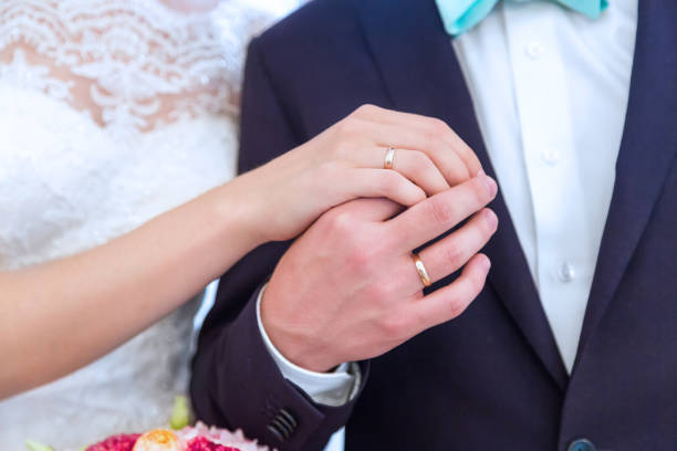 istock Hands with rings of the bride and groom 954306204