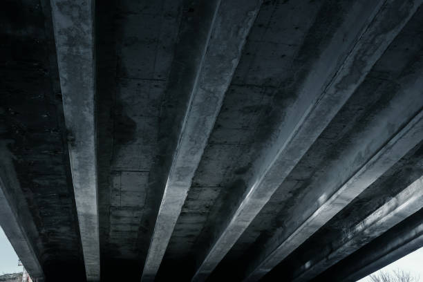 istock The design of the automobile bridge, overpass, view from below. 954306596