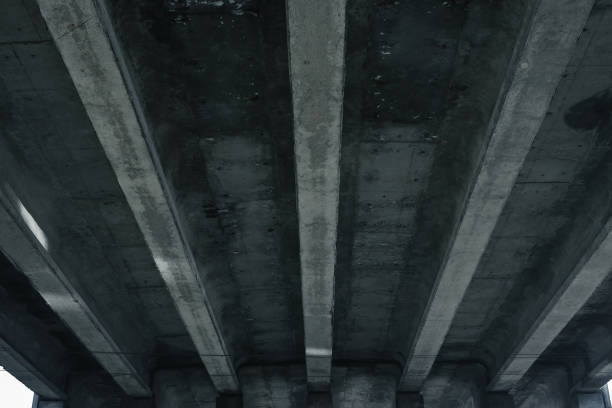 istock The design of the automobile bridge, overpass, view from below. 954306622
