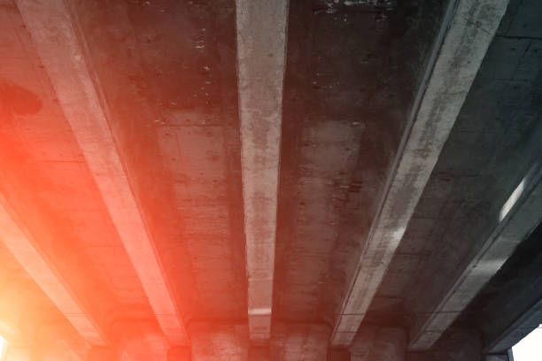 istock The design of the automobile bridge, overpass, view from below. 954307540