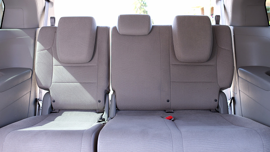 A view of an empty back seat in a car or caravan.