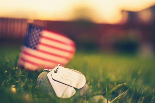 Memorial Day flag and dog tags in evening sunshine