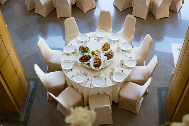 istock catering table set service with silverware and glass stemware at restaurant before party 954311882