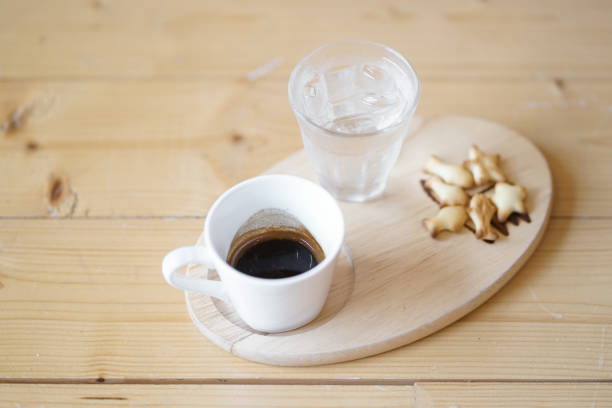 Espresso. cup of coffee and biscuit.