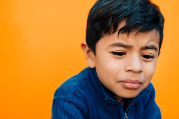 istock Portrait of a sad little boy 954317298
