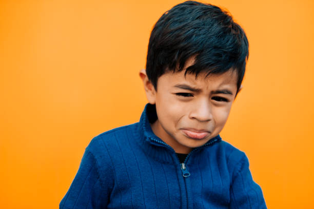 istock Portrait of a sad little boy 954321010