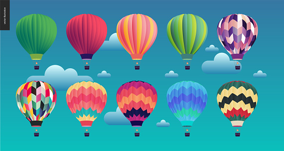 Hot air balloons - set of various colored balloons in the sky with clouds