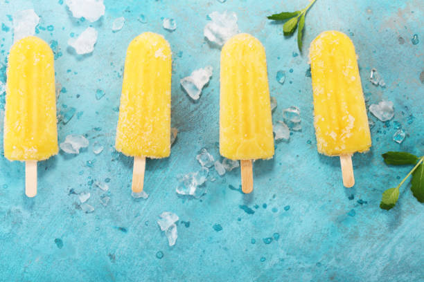 istock Colorful orange popsicle mango banana flavour 954330342