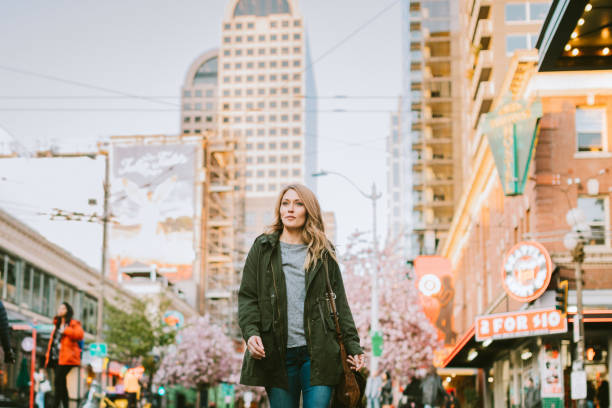 istock A Confident Woman Walks Around Downtown Seattle 954333856