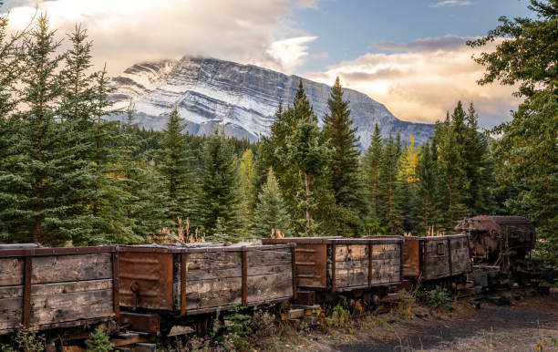 istock coal mining cars from lower bankhead with Mount Rundle 954334522