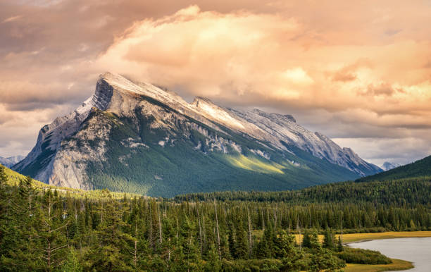 Autumn Sunset of Mount Rundle from Banff Vermilion Lakes This is taken from a scenic pull off on the Trans Canada Highway, just before you get to Banff rocky mountains banff alberta mountain stock pictures, royalty-free photos & images