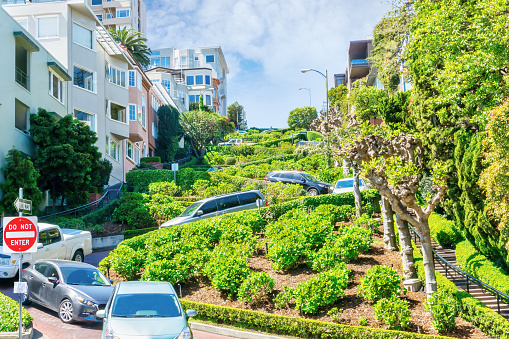 San Francisco Lombard Street, famous for its steep, one-block section of 8 hairpin turns dubbed the crookedest street in the world. It is a major attraction in the Russian Hill neighborhood with 2 million visitors a year.