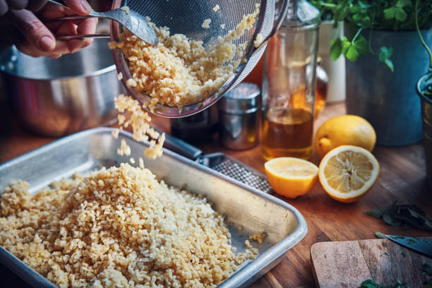 Bulgur with Lemon and Root Vegetables Bulgur with Lemon and Root Vegetables bulgur wheat stock pictures, royalty-free photos & images