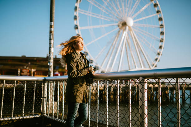 istock Female Film Photographer Explores Seattle Waterfront 954339920