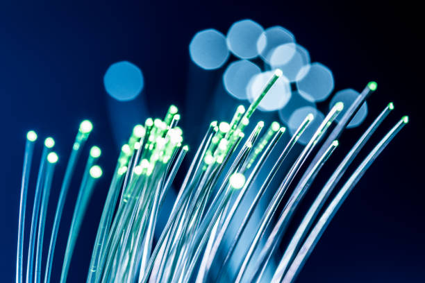 istock Bundle of optical fibers with lights in the ends. 954340052