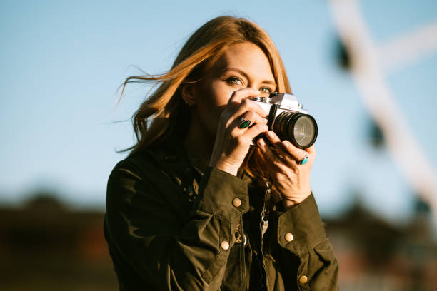 istock Female Film Photographer Explores Seattle Waterfront 954340082