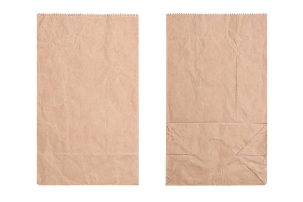 sac en papier brun, plat laïc. - green bag paper bag isolated photos et images de collection