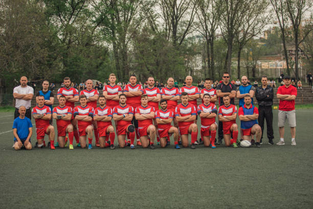 Rugby team Group of people standing on the field, group photo of rugby team. rugby team stock pictures, royalty-free photos & images