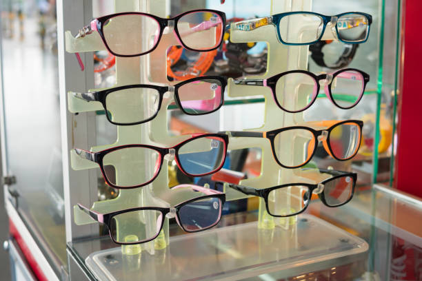 istock Row of luxury eyeglass at an opticians store 954346968