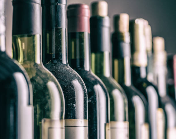 istock Line of wine bottles. 954349150