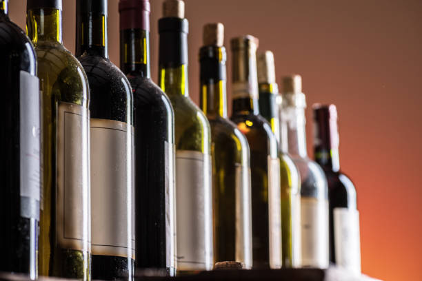 istock Line of wine bottles. 954349172