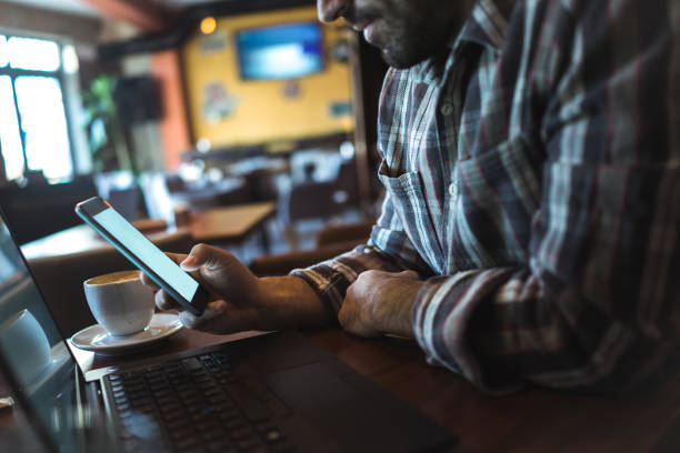 istock Working on laptop in a coffee shop 954353252