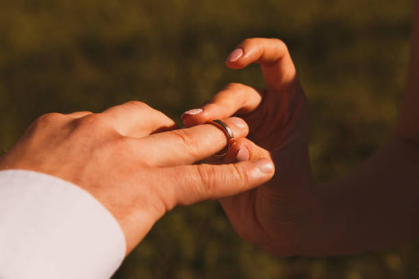istock Man giving an engagement ring to his girlfriend 954356606